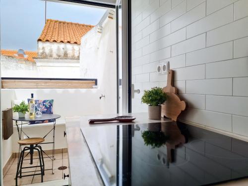 Foto MINHA CASA SUA CASA - Cozy Little House, AC & WiFi 4