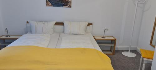 Postel nebo postele na pokoji v ubytování Ferienhaus Pauls Ferienhaus Pauls, Whg 08