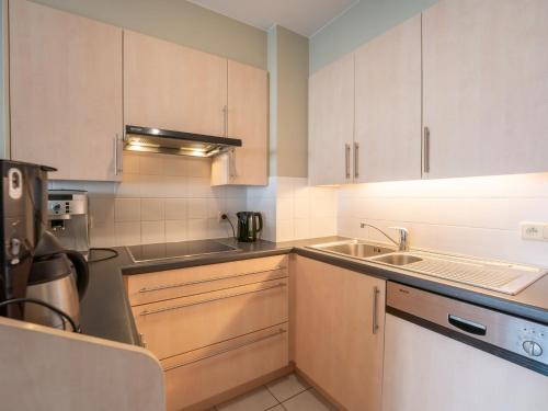 Kuchyň nebo kuchyňský kout v ubytování Apartment Flipper nearby the beach by Interhome