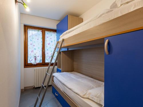 Postel nebo postele na pokoji v ubytování Apartment Manuela by Interhome