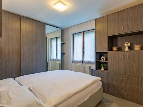 Postel nebo postele na pokoji v ubytování Apartment Manuela by Interhome
