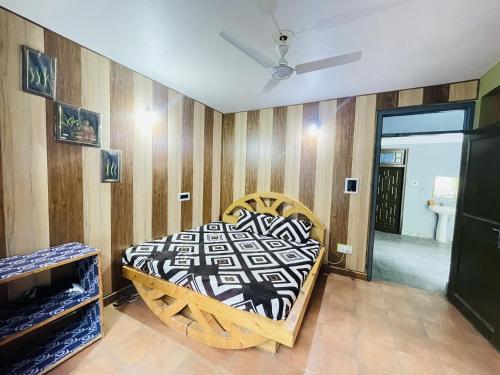 Ein Bett oder Betten in einem Zimmer der Unterkunft Destination Of Choj ( DOC)