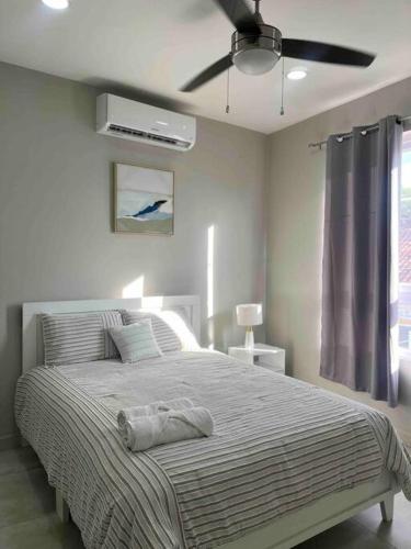 Cama ou camas em um quarto em Apartamento nuevo y acogedor en Choluteca.