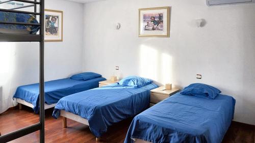 Posteľ alebo postele v izbe v ubytovaní Villa spacieuse à Laroque-des-Albères avec piscine privée