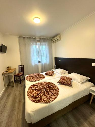 Ένα ή περισσότερα κρεβάτια σε δωμάτιο στο Casa do Paço