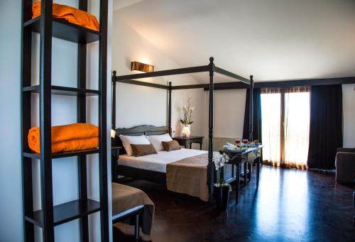 Krevet ili kreveti na kat u jedinici u objektu Zeta Resort Donnalucata