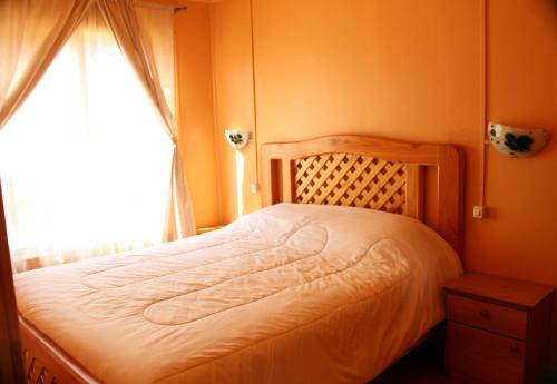 A bed or beds in a room at Cabañas VyB Empresas con factura y particulares
