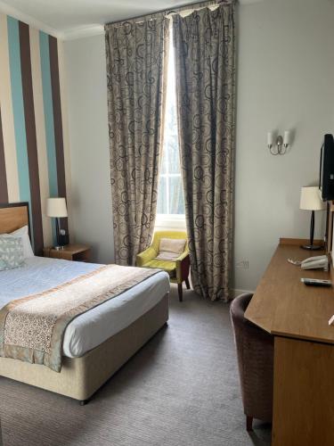 Katil atau katil-katil dalam bilik di The Riverside House Hotel