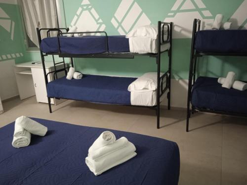 Letto o letti in una camera di Hotel Napoleon