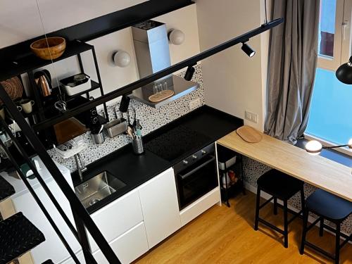 Η κουζίνα ή μικρή κουζίνα στο SG Apartamentos, Silió 4B AT 47-79