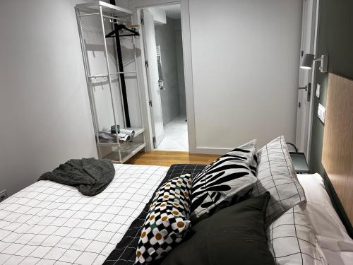 Ένα ή περισσότερα κρεβάτια σε δωμάτιο στο SG Apartamentos, Silió 4B AT 47-79