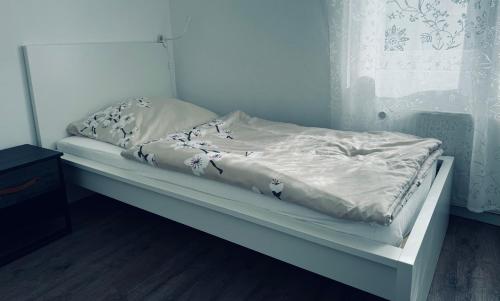 Cama ou camas em um quarto em Apartment 110qm 3 Schlafzimmer 1 Wohnzimmer Garten