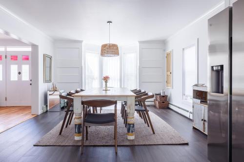 a kitchen and dining room with a table and chairs at Private Village Home in Catskill Splendor in Catskill