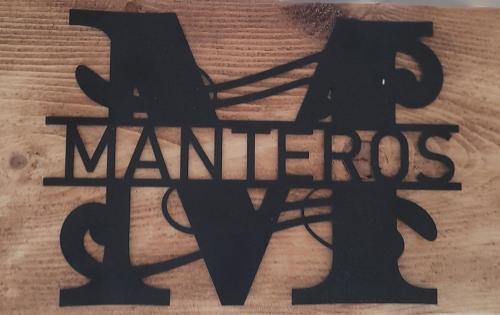 a wooden sign with the name of marietos at Bel des Prés - Mantéros in Carquefou