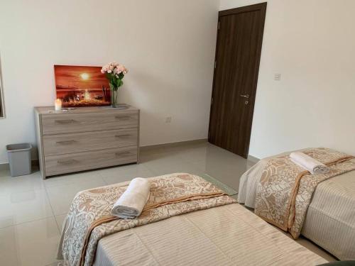 Voodi või voodid majutusasutuse Ta'lonza Luxury Near Goldenbay With Hot Tub App1 toas