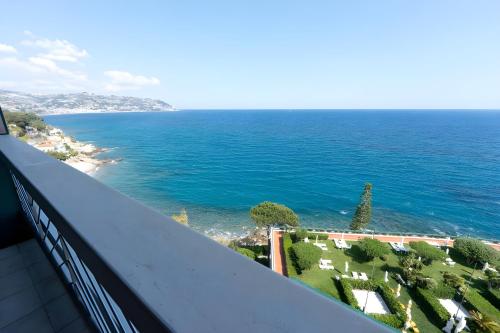 a view of the ocean from a balcony at Grand Hotel Del Mare Resort & Spa in Bordighera
