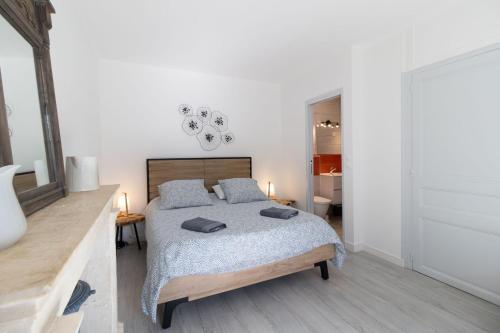 Postel nebo postele na pokoji v ubytování La maison du pêcheur