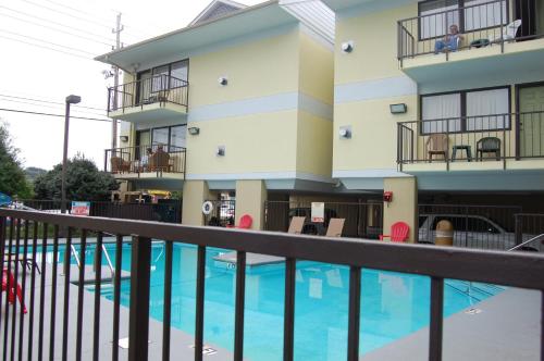 a view of the hotel from the pool at Vacation Lodge in Pigeon Forge
