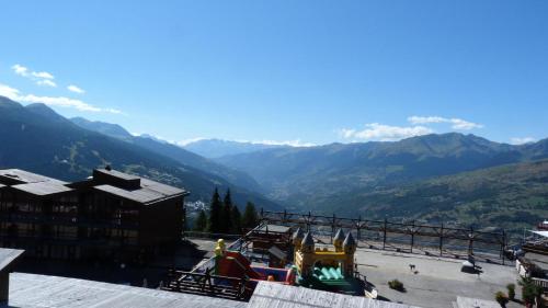 Photo de la galerie de l'établissement Résidence Tournavelles - Appartement 2 pièces 7 personnes en duplex, au pied des pistes et des commerces, proche de l'ESF et de la garderie dans le villa MAE-1875, à Arc 1800
