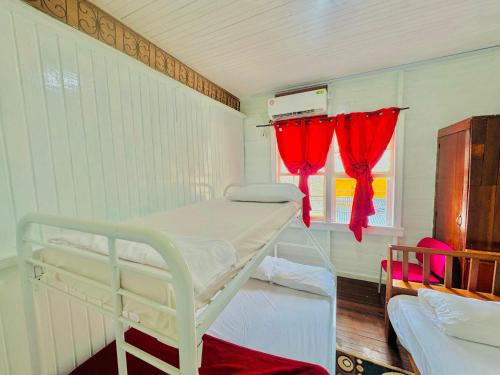 Cama o camas de una habitación en SMITH'S HOMESTAY