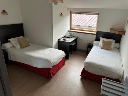 Кровать или кровати в номере Auberge Champenoise