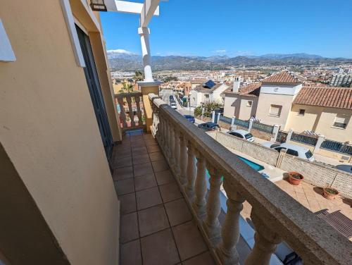 a balcony with a view of a city at Viña Home in Torre del Mar