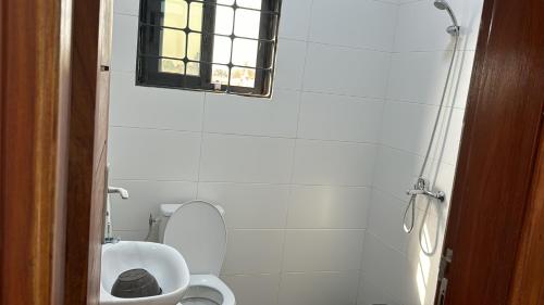 Un baño de ilé-ifè GUESTHOUSE OUIDAH