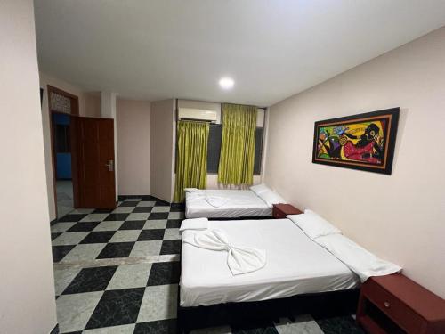 Postel nebo postele na pokoji v ubytování Hotel damayu