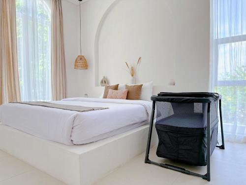 Ένα ή περισσότερα κρεβάτια σε δωμάτιο στο Close to Jimbaran Beach, 3BR with Private Pool