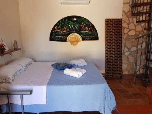 En eller flere senger på et rom på One bedroom house with shared pool terrace and wifi at Palma 4 km away from the beach