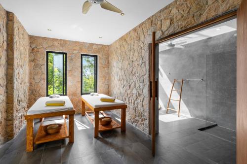 a bathroom with two sinks and a shower at Karpe Diem Villa - Twin Infinity Pools in Chaweng Noi Beach