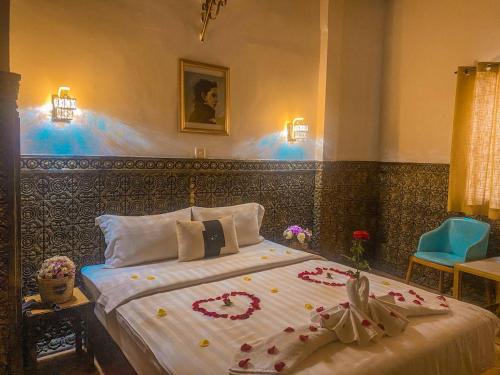 Cama o camas de una habitación en Le Casablanca Hotel
