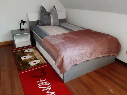 En eller flere senge i et værelse på Appartement in Gehren