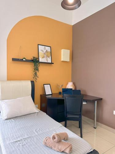 a bedroom with a desk and a bed and a deskictericter at Manhattan Austin By JC Home in Johor Bahru