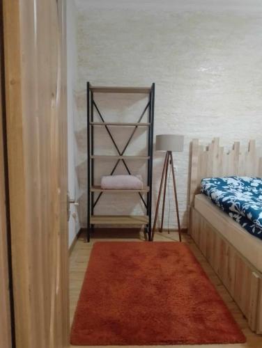 Ένα ή περισσότερα κρεβάτια σε δωμάτιο στο warm house