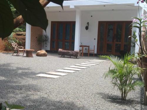 Jardín al aire libre en Oqura Villa