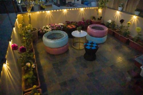 an overhead view of a flower shop with a bunch of flowers at Cozy 1bhk with Terrace. in Lucknow