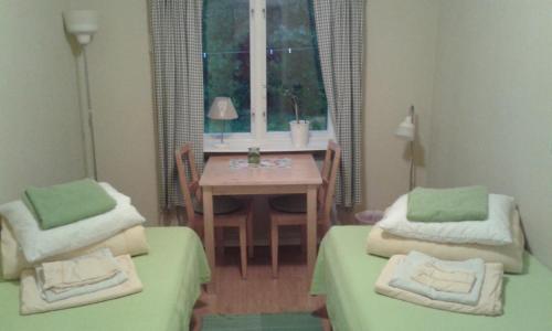 Postel nebo postele na pokoji v ubytování Lilla Hotellet