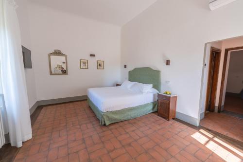 Postel nebo postele na pokoji v ubytování Corte Di Valle