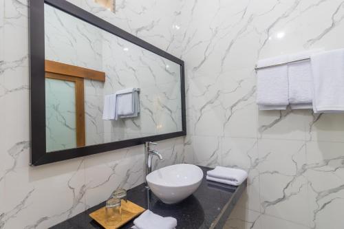 Ένα μπάνιο στο Amed Permai Home Stay