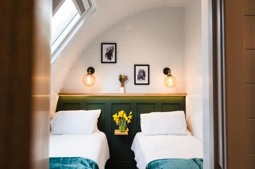 Кровать или кровати в номере Kite Lodge