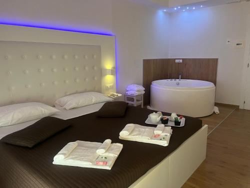 Kúpele alebo wellness v ubytovaní Boutique Hotel e Spa Città Bianca