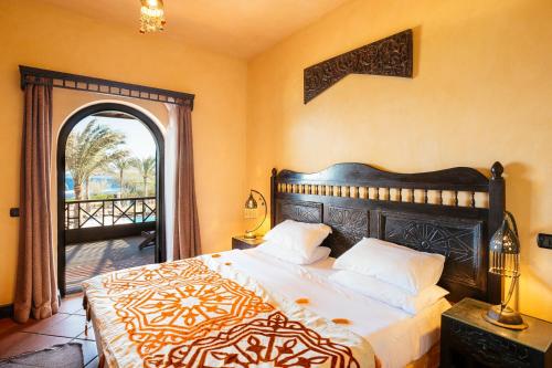 Postel nebo postele na pokoji v ubytování Dahab Paradise