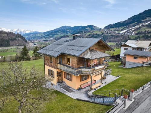 an aerial view of a house with a roof at Miller Appartements in Sankt Veit im Pongau
