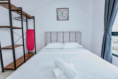 a bedroom with a bunk bed and a ladder at The Horizon Ipoh in Ipoh