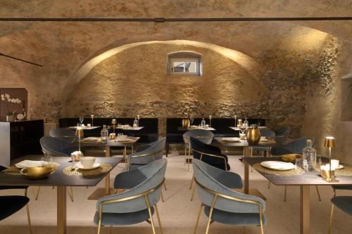 Ansitz Battisti Suitesにあるレストランまたは飲食店