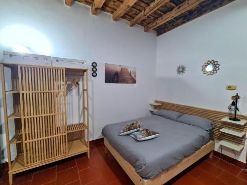 Katil atau katil-katil dalam bilik di Garden House Trezzo