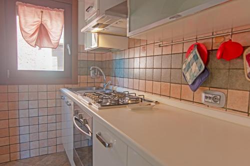 Kuchyň nebo kuchyňský kout v ubytování Il Pescatore - Marina di Campo