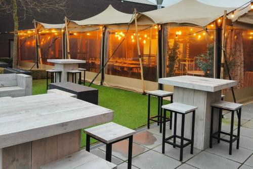 Hotel Den Bergにあるレストランまたは飲食店