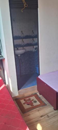 a bathroom with a sink and a bath tub at Sharma atithi bhavan in Prayagraj